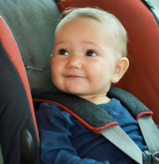 Keeping a baby entertained for hours at a time during a long journey is no easy task, so choosing the right toys is vital. - baby-in-carseat