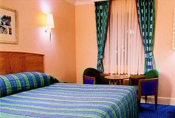 Book a room at the Thistle hotel East Midlands airport A bedroom at the Thistle hotel East Midlands airport.